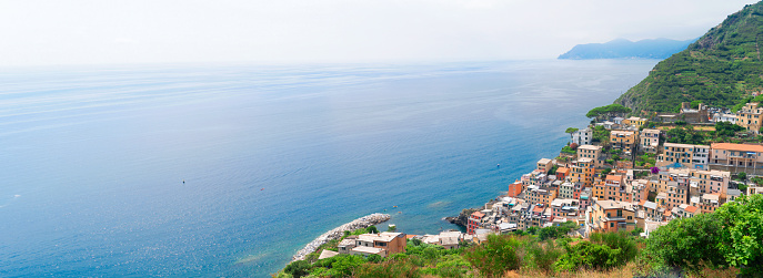 Riomaggiore picturesque town of Cinque Terre, Italy, web banner wide panorama