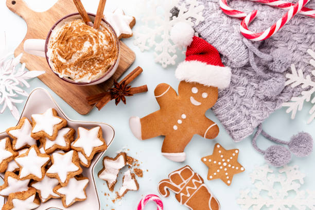 istock Gingerbread man, cookies and Christmas decor on pastel background. 1369991444