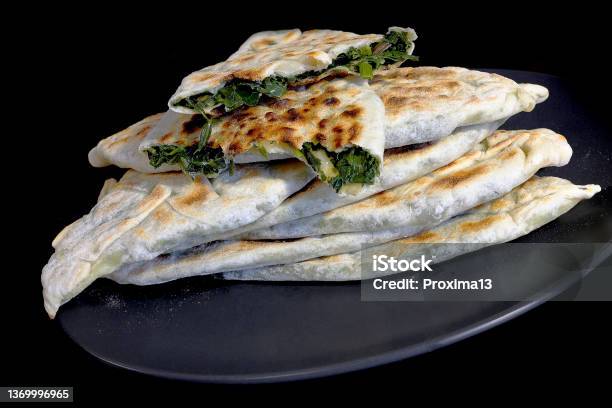 Baking Of Traditional Armenian Food Zhengyal Bread Bread With Different Greens Crosssection Of An Armenian Zhengyal Bread With Shallow Depth Of Field Stock Photo - Download Image Now