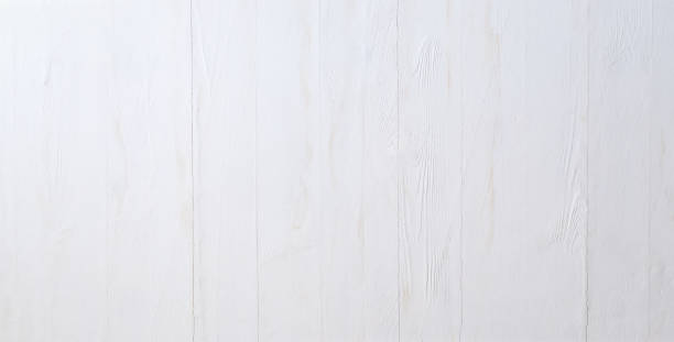 istock White panoramic wooden background with spots and scratches 1369998093