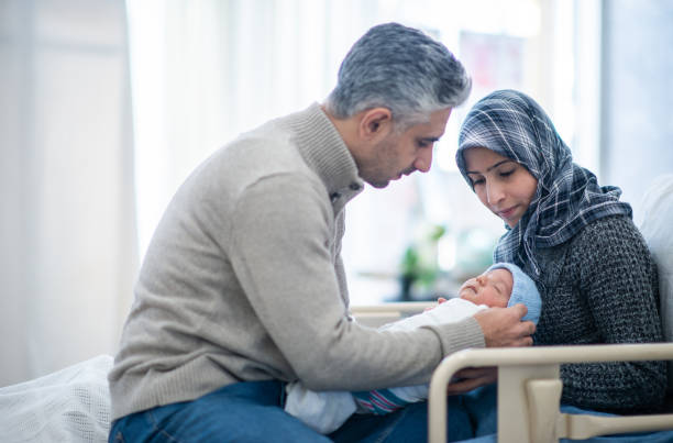 istock Afghan Father Meeting His Newborn Son 1370008369