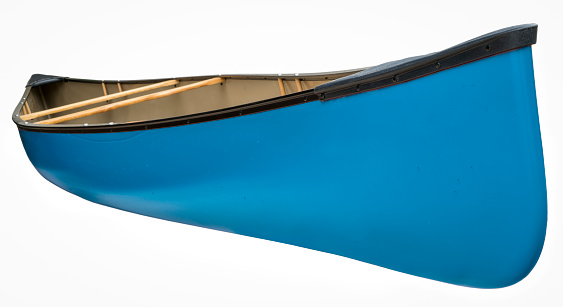 blue tandem canoe with wood seats isolated on white, water droplets on a hull