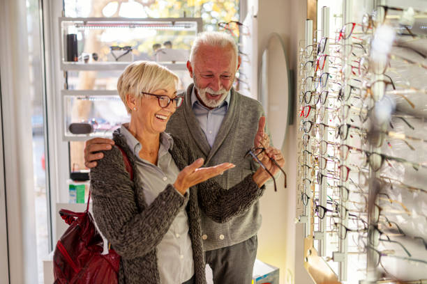 istock Senior couple shopping for eyeglasses 1370018385