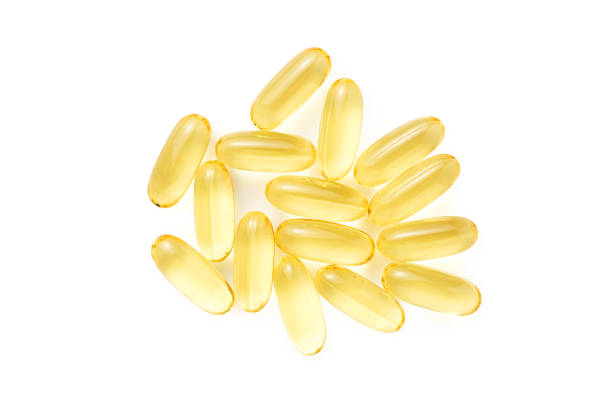 istock Heap of Omega 3 soft gel capsules isolated 1370018773