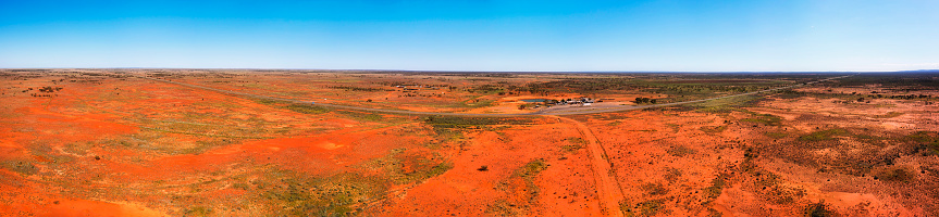 Little topar roadhouse rest area stop over on Barrier highway near Broken hill city of Australian outback - wide aerial panorama.