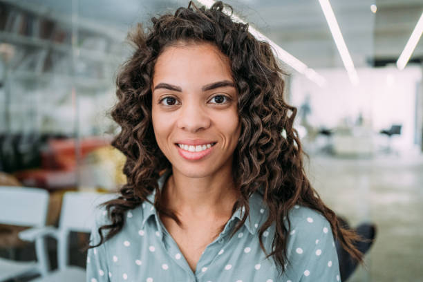 istock Confident businesswoman in modern office. 1370020934