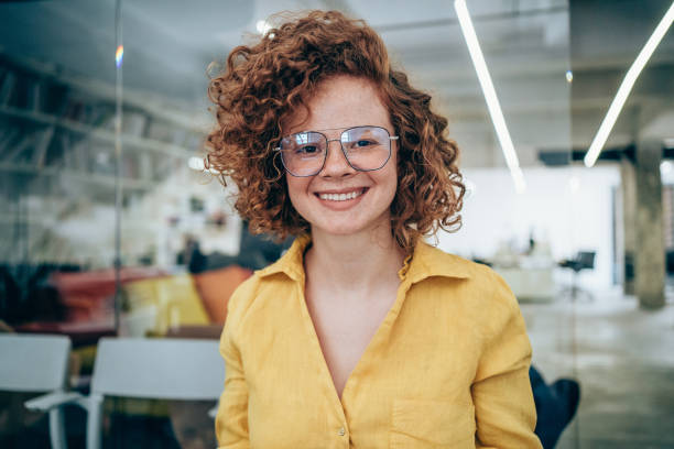 istock Confident businesswoman in modern office. 1370020944