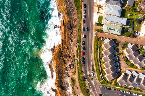 Pacific ocean coast waterfront on Sydney north shore with strata title villas by seaside.