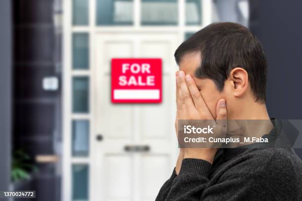Depressed Man Losing His House Due To Debts And Mortgage Stock Photo - Download Image Now