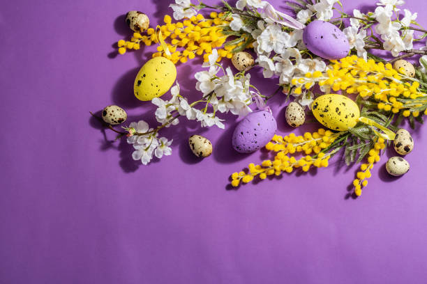 istock Spring composition with flowers, pastel eggs on purple very peri background. Happy Easter 1370025984