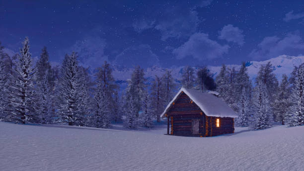 istock Solitary mountain cabin at snowfall winter night 1370027027