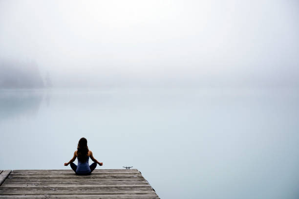 istock Lakeside yoga and meditation 1370028231