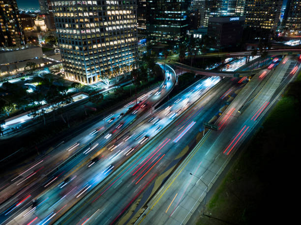 istock 110 Passing Downtown LA at Night - Aerial 1370032610