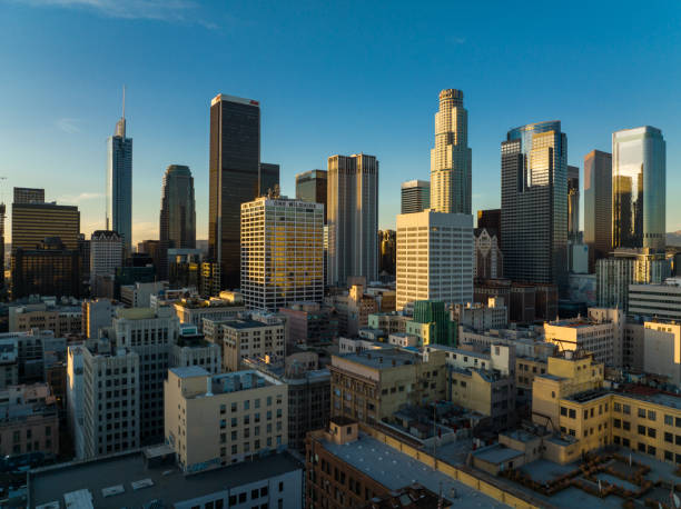 Aerial shot of Downtown Los Angeles at sunset, looking over the Historic Core towards financial district skyscrapers on Bunker Hill.