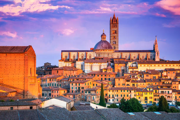 istock Siena, Tuscany, Italy - Dome sunset with blue sky 1370035666