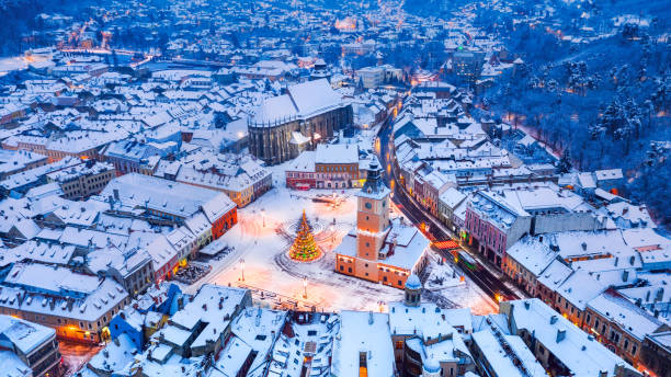 istock Brasov, Romania - Council Square and Christmas tree aerial view, 1370035704