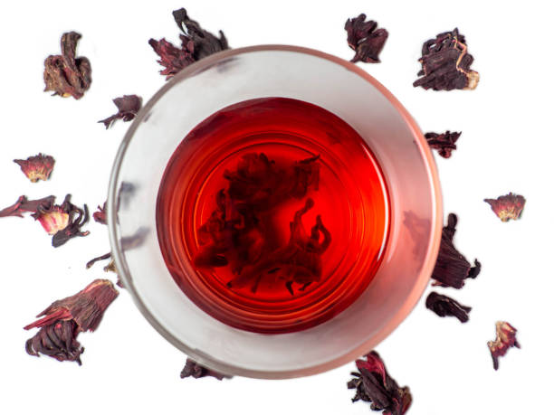 istock Karkade. Tea drink in a glass. Red liquid in a glass. 1370036705