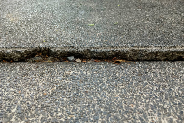 istock grunge crack floor on cement. 1370040215