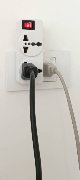 istock Multiple socket outlets, electrical equipment, wires and power strips in your home save electricity. 1370040224