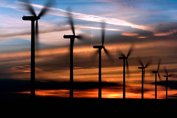 wind farm silhouette wind farm in silhouette at dusk landscape alternative energy scenics farm stock pictures, royalty-free photos & images