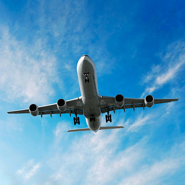 istock jet airplane landing in bright sky 137004160