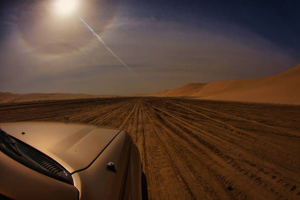 Truck in desert with hills