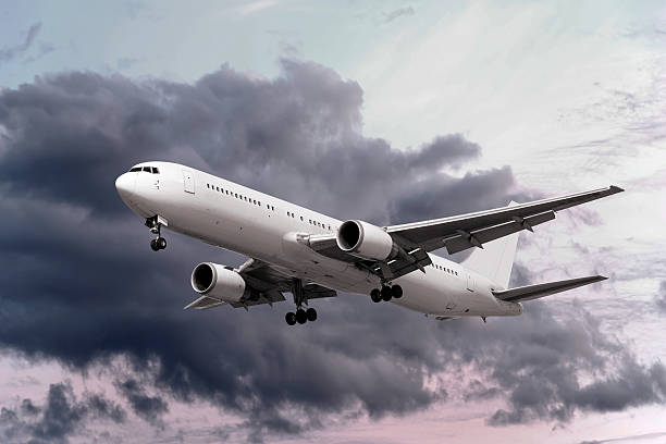 istock XXL jet airplane landing at dusk 137004736