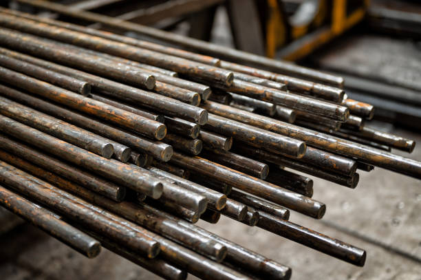 A bundle of round metal bars, steel mill products