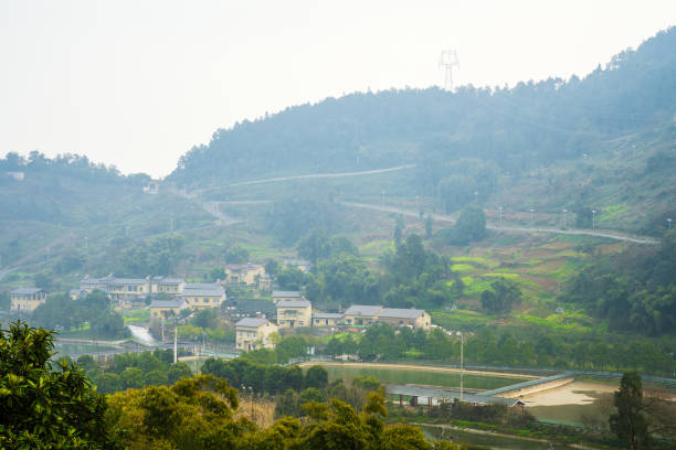 istock Cloudy and foggy mountain countryside 1370058241