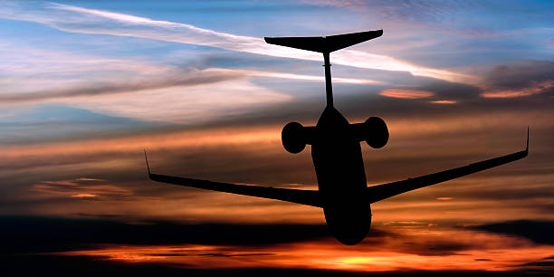 istock XL corporate jet airplane flying at dusk 137006162
