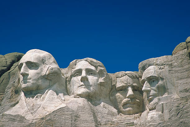 Mount Rushmore on a clear day with blue sky stock photo