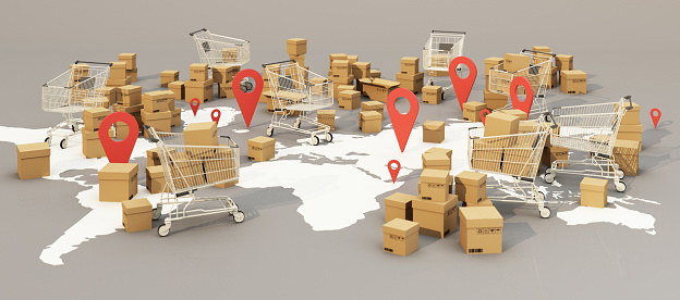 the Earth world map surrounded by cardboard boxes, paper box and shopping cart with gps location on gray background 3D rendering panorama view