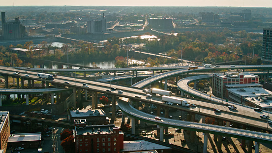 Drone shot of elevated freeways on the bank of the James River in Richmond, Virginia.