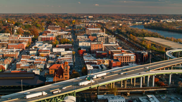 istock Evening Sunlight on Freeway and Brick Buildings in Richmond, VA - Aerial 1370067846