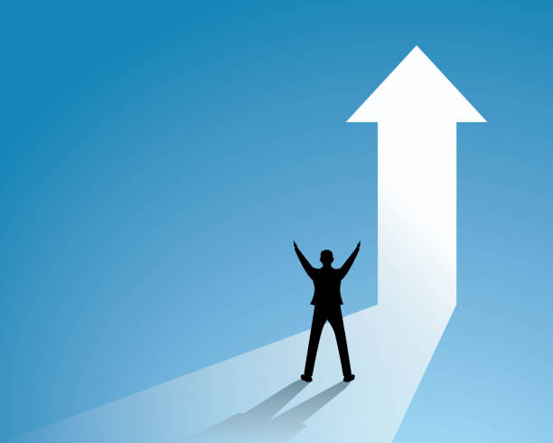istock Success in business, businessman celebrating victory, winning gesture in front of light gate, symbol of achievement or reaching his target 1370072941