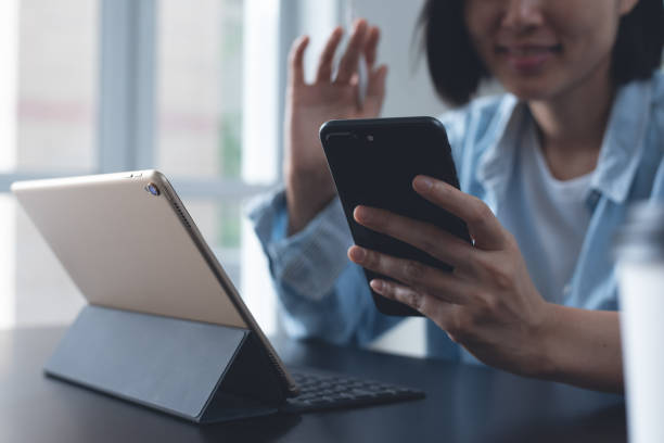 istock Business woman working on digital tablet, laptop computer 1370072959