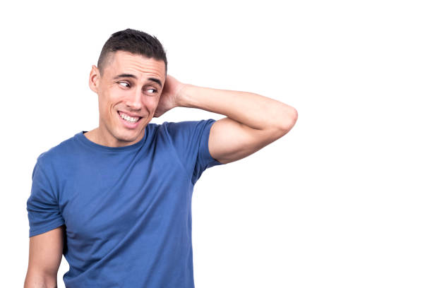 istock Shy man with his hand on his neck dissimulating 1370074026