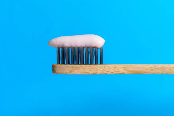 istock Eco friendly toothbrushes made of natural bamboo. Toothpaste close up. House with zero waste. bathroom essentials. 1370075001