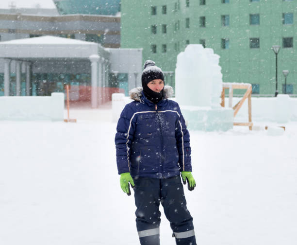 istock Portrait of a worker with a balaclava on his head 1370080005