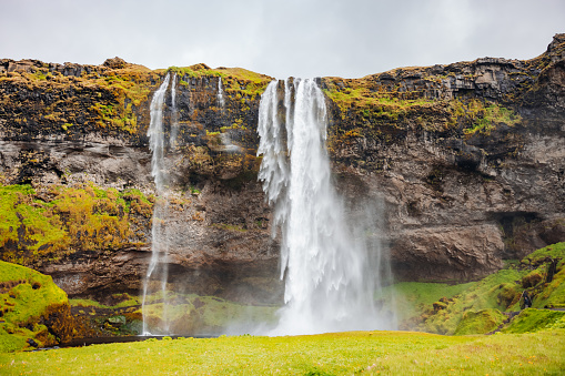 Natural landscape with Seljalandsfoss waterfall, one of the most popular natural landmarks of icelandic nature. Seljalandsfoss Waterfall, Southern Iceland, Northern Europe
