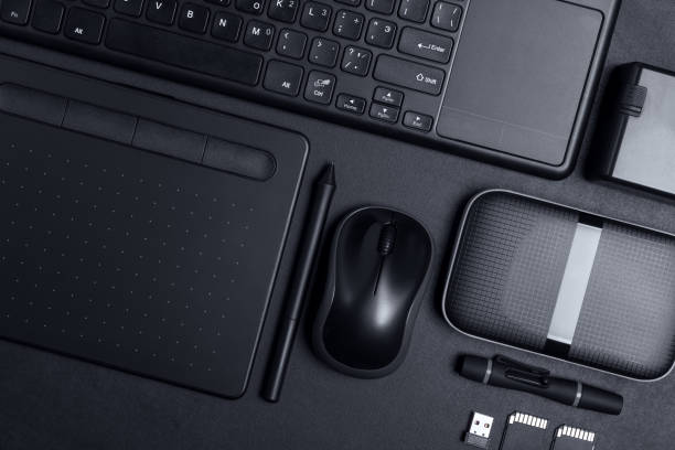 istock Designer work place with graphics tablet, memory card, keyboard and portable hard drive 1370095883