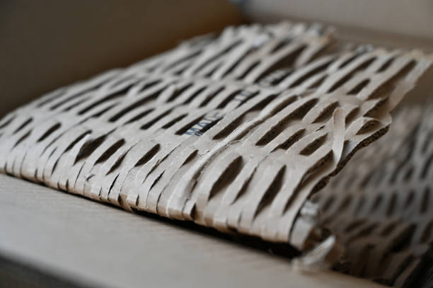 istock A close-up of the perforated wrapping cardboard. Recycled raw material for parcel packaging. The inscription MADE IN CHINA. 1370098311