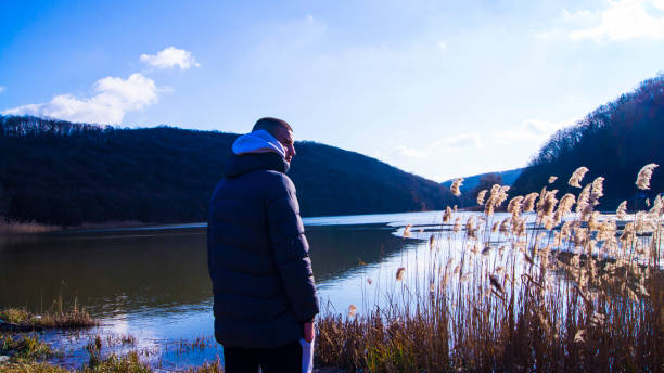 istock A wonderful young man in nature during the winter 1370099734