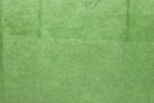 istock close-up of green paper texture background 1370100337