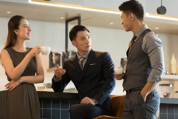 istock Successful Chinese businessmen chat in coffee shops 1370101310
