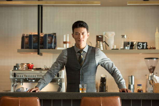 Portrait of Chinese young man in bar stock photo