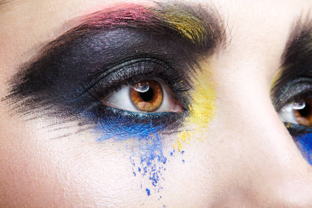istock Female eye with unusual artistic painting makeup 1370109791