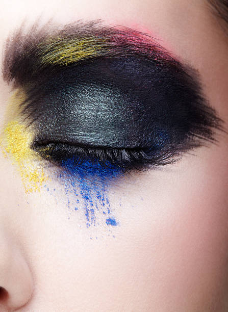 istock Female closed eye with unusual artistic painting makeup 1370109807