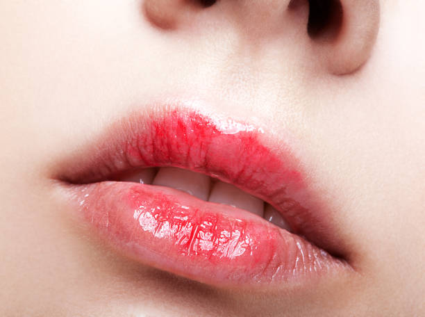 istock Woman with red lips makeup 1370109816