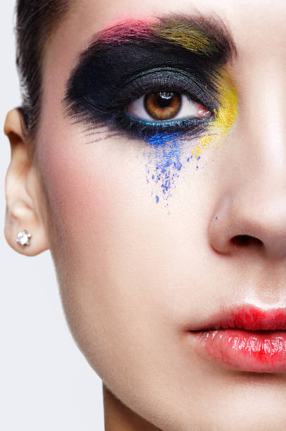 istock Female eye with unusual artistic painting makeup 1370109840